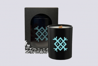 Scented candle with symbol of Earth