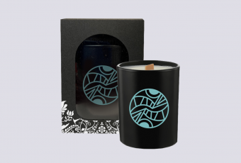 Scented candle with symbol of United worlds