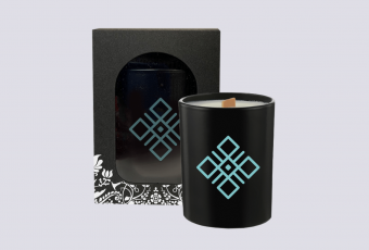 Scented candle with symbol of four elements