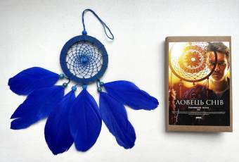 Colored amulet "Dream Catcher" and postcard with a prediction