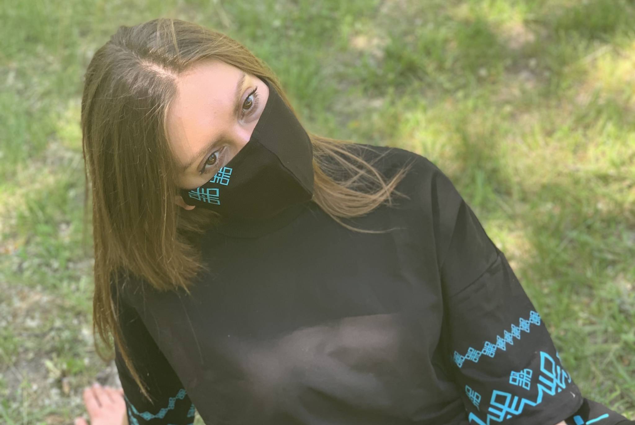 Black Protective Mask with Turquoise Rune