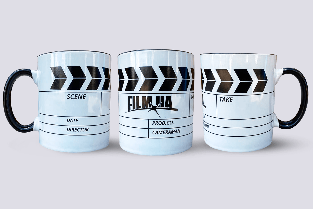 Black-and-white cup Film.Ua with clapboard